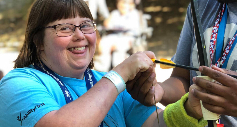 AbilityFirst camper practicing archery