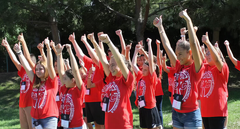 TACSC students raising hands